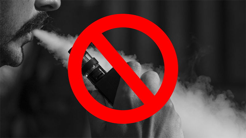 Ban On E-Liquids In The United States: Disadvantages And More 1 E-LIQUID BANNED IN USA BLOKE VAPING WITH CROSS